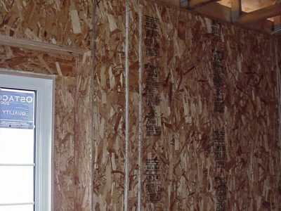 A vertical electrical chase from the ceiling, for light switches.